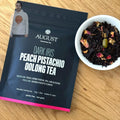 Dark Iris - Peach Pistachio Oolong Tea August Uncommon Tea